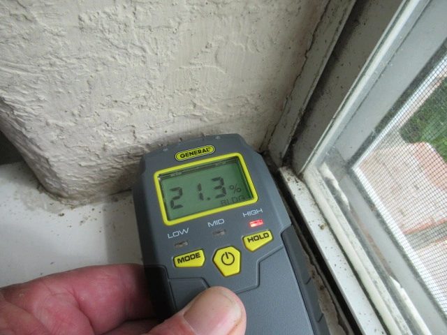 High moisture reading in sheetrock opening of windows.